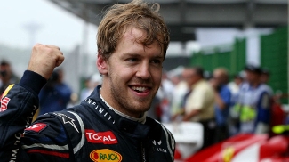 Sebastian Vettel comemora a conquista do tricampeonato mundial de F-1 em Interlagos