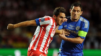 Koke duela com Lampard na Supercopa da Europa de 2012