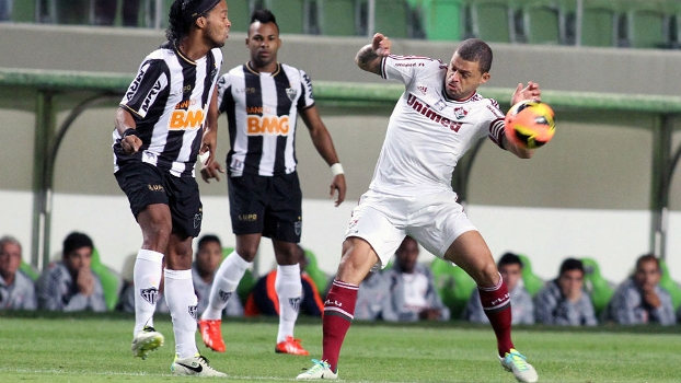 Atlético-MG, de Ronaldinho Gaúcho, e Fluminense, de Edinho, empataram nesta quarta-feira, no Independência Atlético-MG, de Ronaldinho Gaúcho, e Fluminense, de Edinho, empataram nesta quarta-feira, no Independência