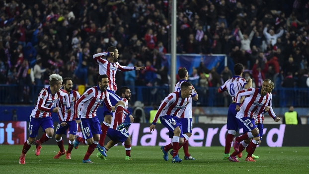 Jogadores do Atlético de Madri comemoram ao vencerem nas penalidades