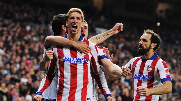 Fernando Torres comemora: ele marcou duas vezes no empate contra o Real Madrid Fernando Torres comemora: ele marcou duas vezes no empate contra o Real Madrid