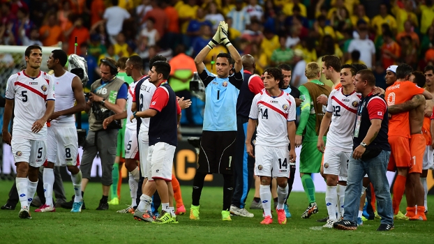 A Costa Rica chocou a todos quando venceu o Uruguai e eliminou Itália e Inglaterra na primeira fase, só parando nas quartas contra a Holanda A Costa Rica chocou a todos quando venceu o Uruguai e eliminou Itália e Inglaterra na primeira fase, só parando nas quartas contra a Holanda