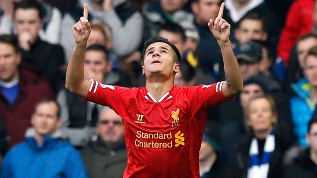 Philippe Coutinho comemora gol: meia amadureceu no Liverpool e foi eleito o melhor brasileiro no exterior Philippe Coutinho comemora gol: meia amadureceu no Liverpool e foi eleito o melhor brasileiro no exterior